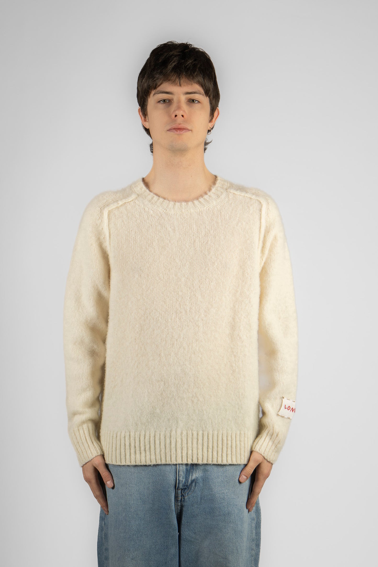 Man's plain knitted crewneck sweater