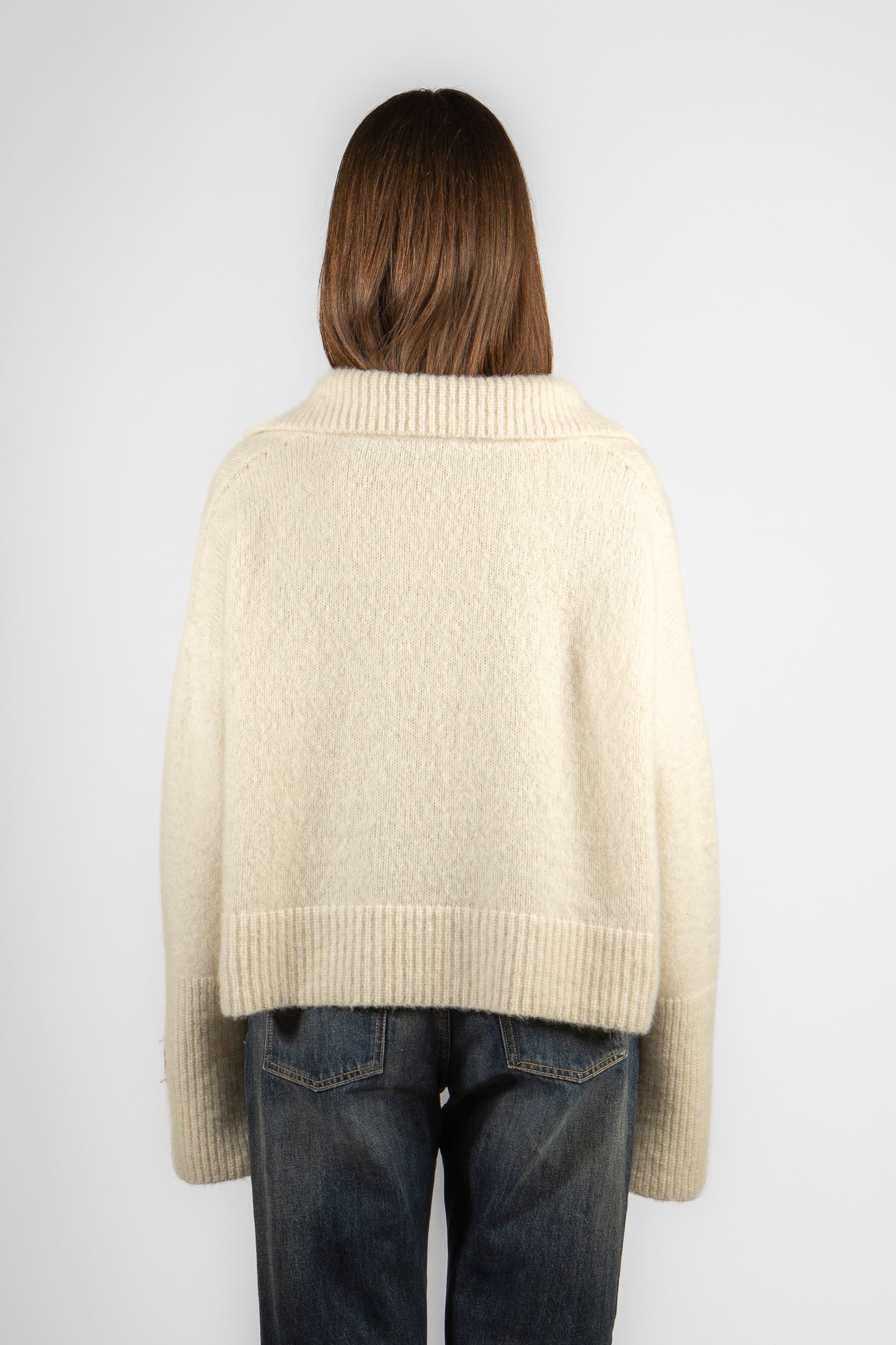 Woman's knitted V-neck polo